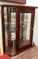 Beautiful curved glass wooden curio cabinet with