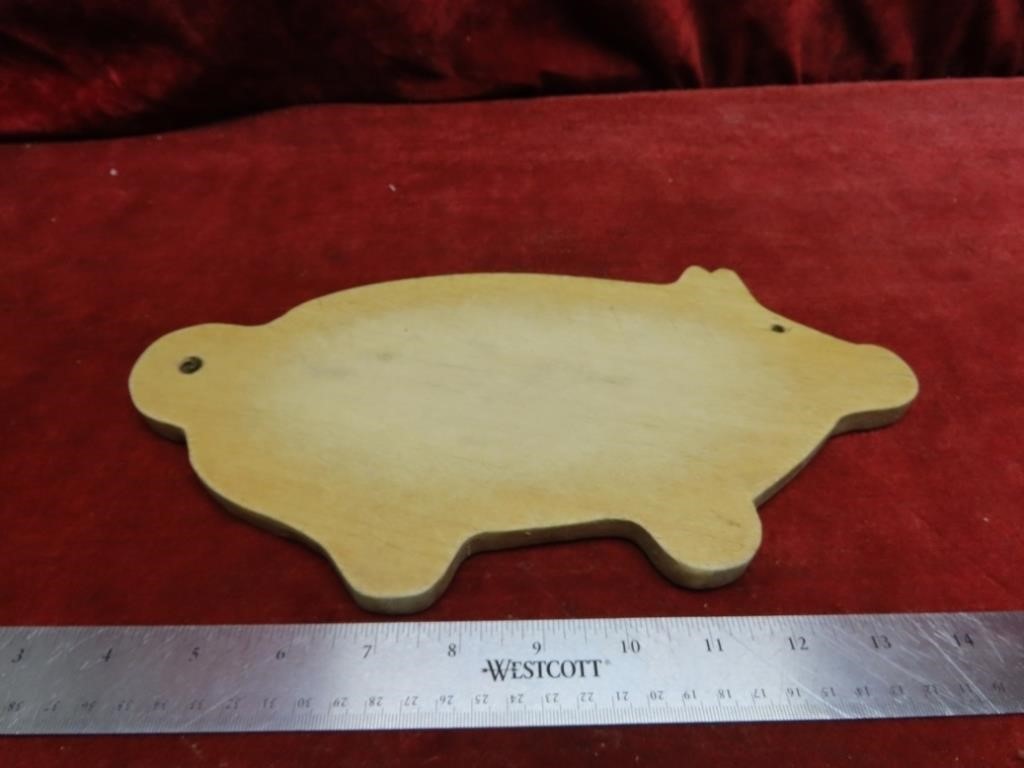 Primitive wood pig cutting board.
