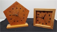 Two handmade clocks.
