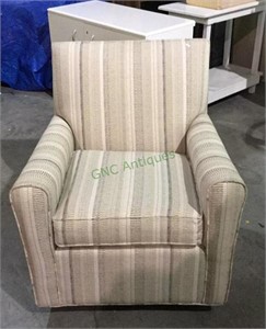 Very nice upholstered swivel and rocking side