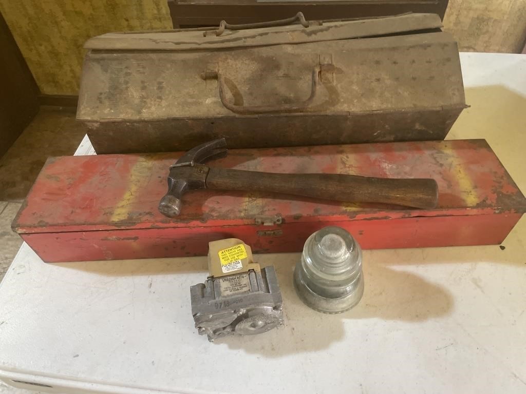 Two metal tool boxes, hammer, glass insulators,