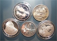 Five 1-ounce Troy silver rounds