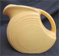 Small yellow fiestaware pitcher