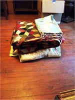 Stack of crazy quilts and Afghan
