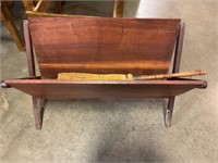 Antique wood holder with broom