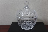 A Facet Glass Jar With Lid