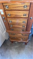Wooden jewelry chest 28 inches tall. Contents not