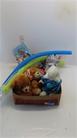 assorted stuffies, puzzle banks
