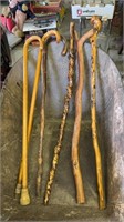 Six canes or walking sticks, four natural found