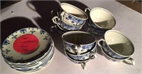 Set of 11 Delft porcelain cups and saucers