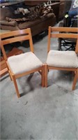 two blonde side chairs