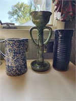 Milk pitcher, stoneware candlestick and vase.