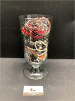 Vase of costume jewelry