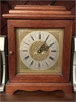 Mantel Clock in wooden case.
