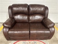 100 % Elran Leather double reclining love seat