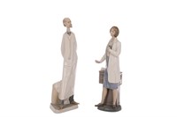 TWO SPANISH PORCELAIN FIGURES OF DOCTORS