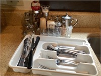 Silverware, tray, and salt/ pepper shakers 
“Hot