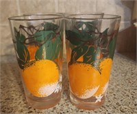 Four orange glasses