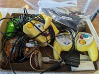 BOX LOT OF GAME CONTROLLERS