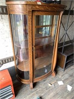 Beautiful curved glass curio display case. Made fr