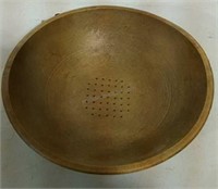Wooden bowl with bottom drainage holes