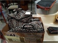 Box of Neiman Marcus travel bags