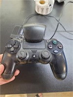 PlayStation controller in holder