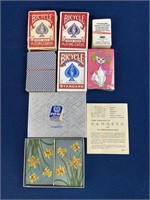 Assorted playing cards and Canasta