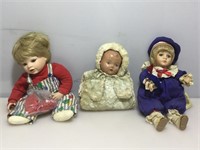 Assorted collector dolls.