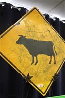 VINTAGE COW IN ROAD ROAD SIGN