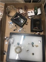 Flat of costume jewelry