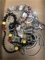 Flat of costume jewelry