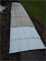 Metal roofing sheets; most are white; some are blu