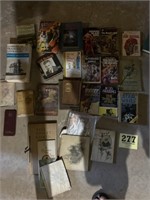 Box of romance, novels, Star Wars, and other