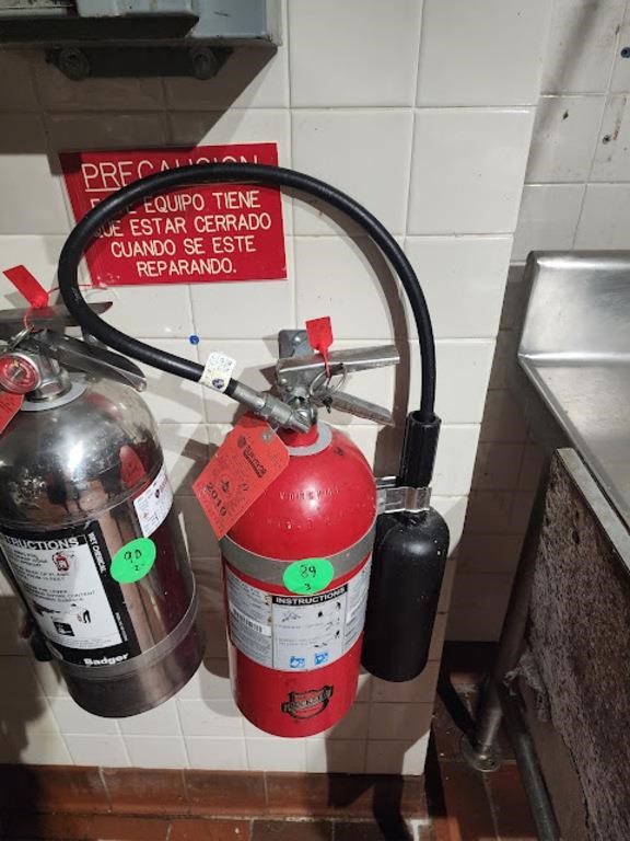 RED FIRE EXTINGUISHERS