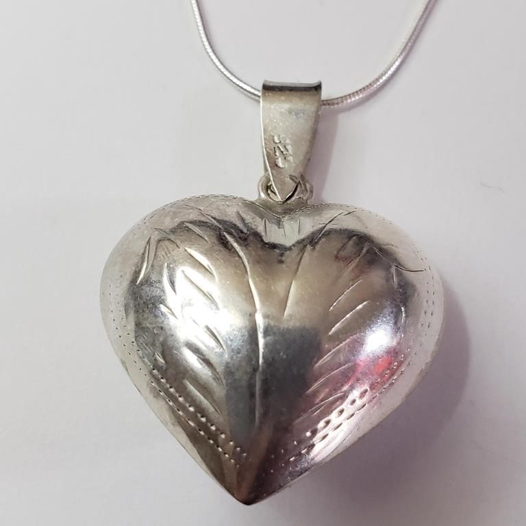 $160 Silver Heart Shaped Necklace