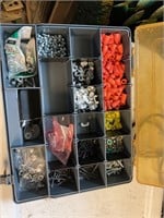 Storage container full of screws,caps etc