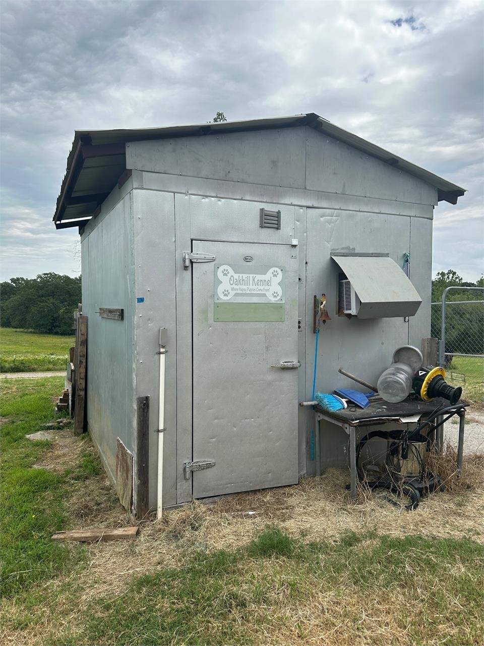 Old freezer made into a Kennel building