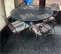 5 piece Iron outdoor patio set with cushions.