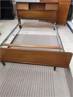 Vintage wooden double size bed.