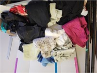 Tub of women's clothes mostly small and medium