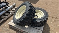 2-27x10.50-15 Skid Steer Tires on 5 Hole Rims