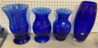 Vases - lot of four royal blue vases. Largest is