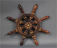 Ornate replica ship’s wheel