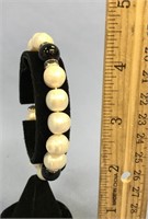 Stretch bracelet of black onyx beads and fresh wat