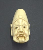 Antique Japanese carved ivory mans face netsuke