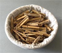 Basket of wooden clothes pins