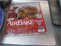 AIR BAKE COOKIE SHEET AND ACRYLIC CUTTING BOARD