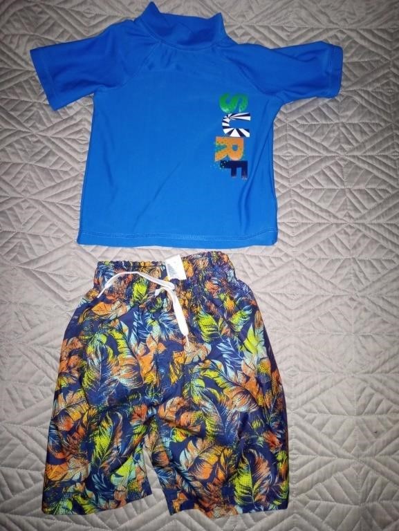 C9) Boys swim shirt and shorts. Shirt 3T, shorts