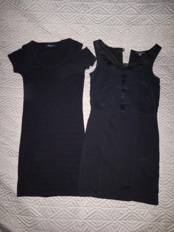 C9) Xs/sm black dresses. Tight fitting, one has
